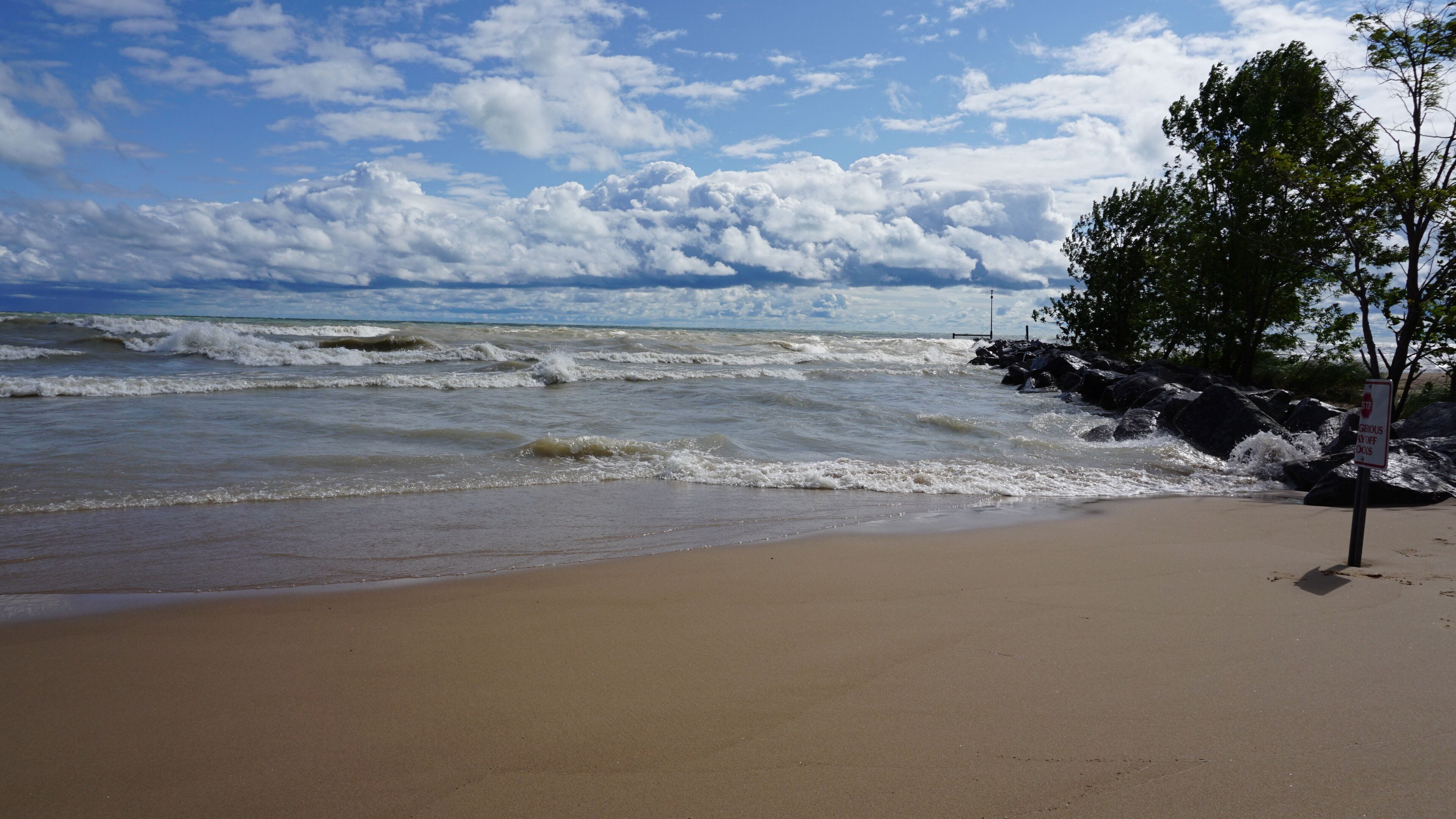 High winds churn up waves on Lake Michigan's Illinois shoreline. The water was closed at local beaches due to rough surf.