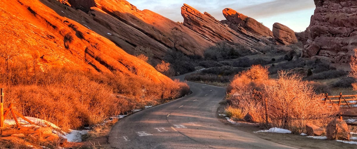 I was driving with my dog when she jumped on my lap and made me miss my turn so I had to turn around but as soon as I pulled down the road to flip around I saw how the sunrise was hitting the rocks! #OnTheRoad