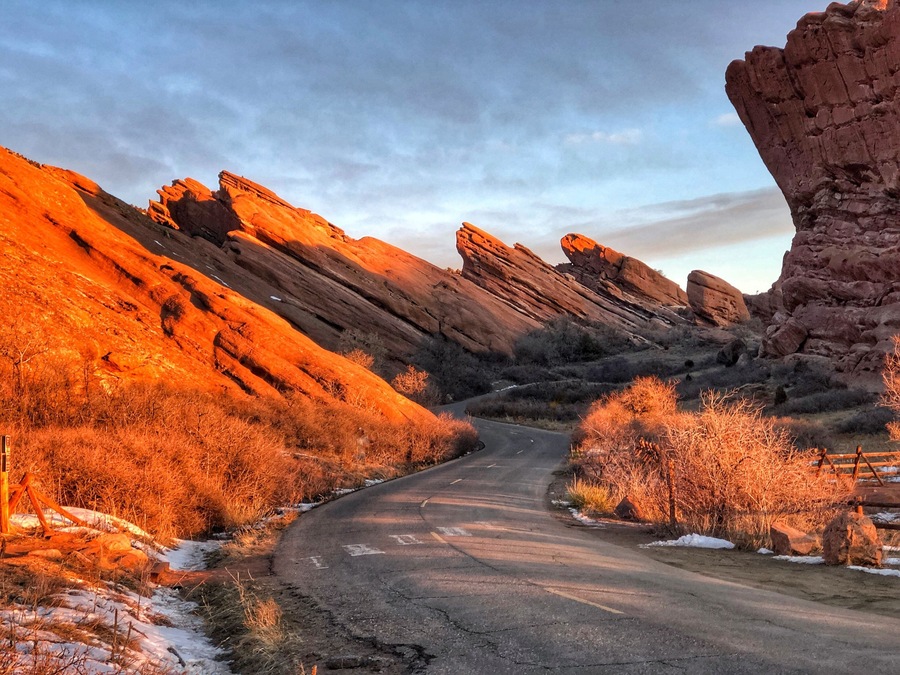 I was driving with my dog when she jumped on my lap and made me miss my turn so I had to turn around but as soon as I pulled down the road to flip around I saw how the sunrise was hitting the rocks! #OnTheRoad