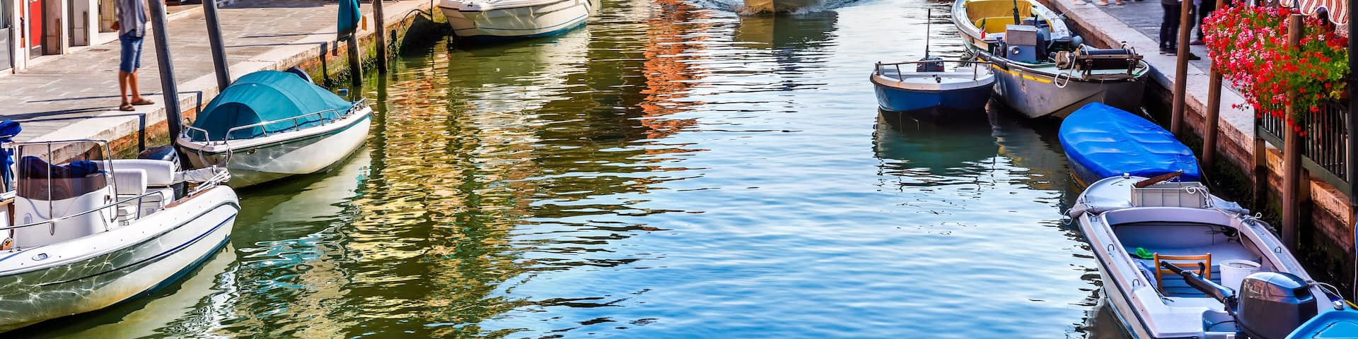 Island murano in Venice Italy. View on canal with boat and motorboat water. Picturesque landscape., Shutterstock ID 720444505, Purchase Order: -