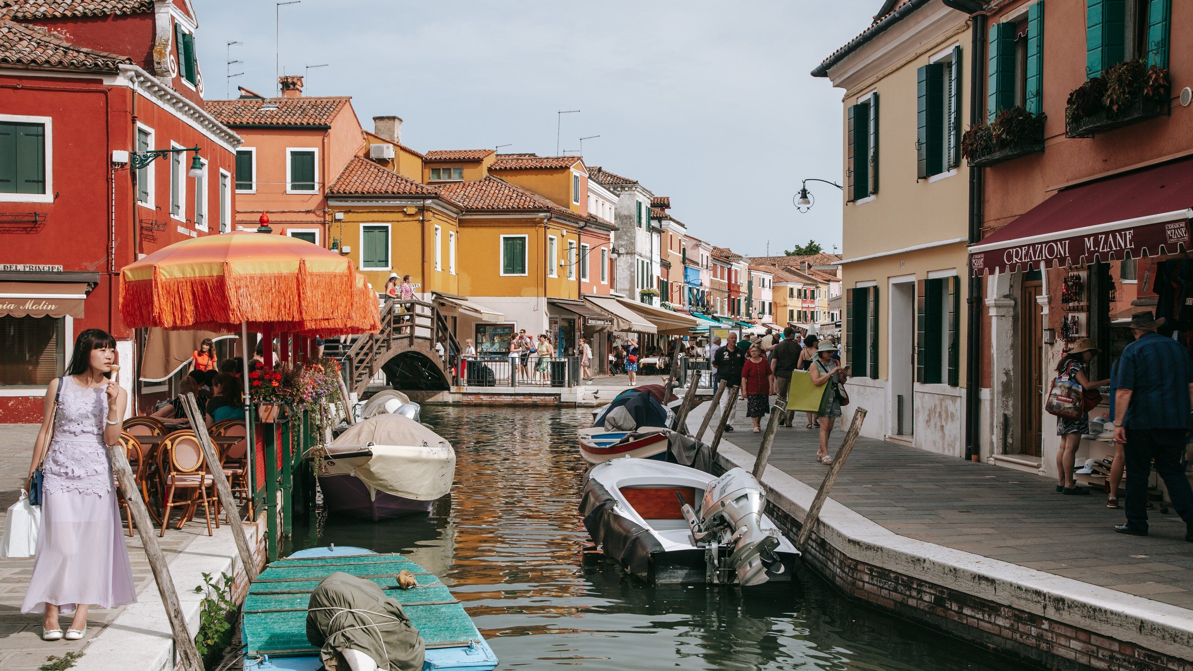 Burano which includes street scenes and a river or creek