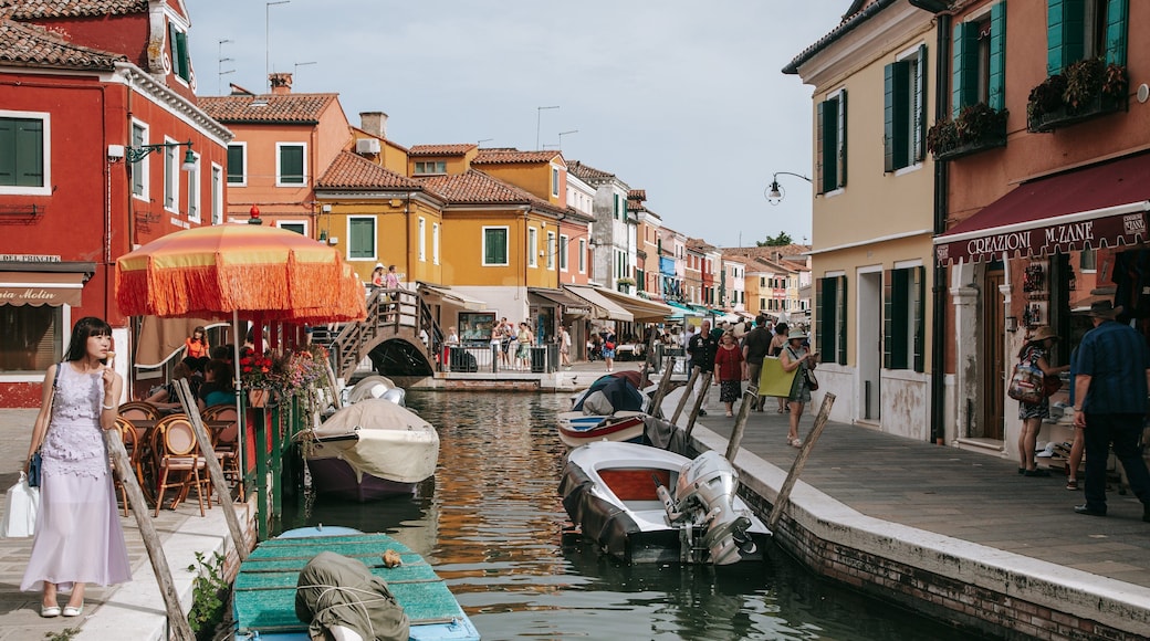 Burano which includes street scenes and a river or creek