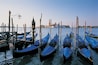 Gondolas at their Moorings on the Grand Canal, San Giorgio Maggiore, Venice, Italy