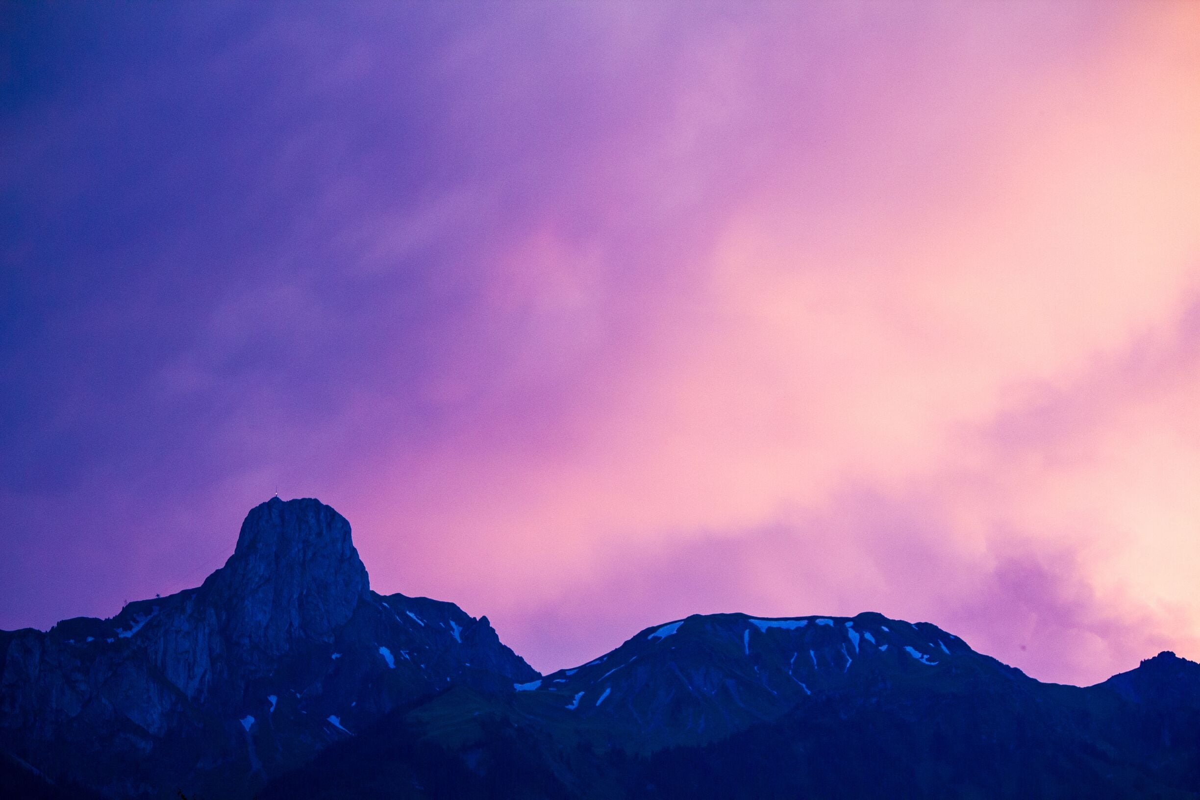 The beauty of the alps at afterglow. Honestly this is the view from my apartment.