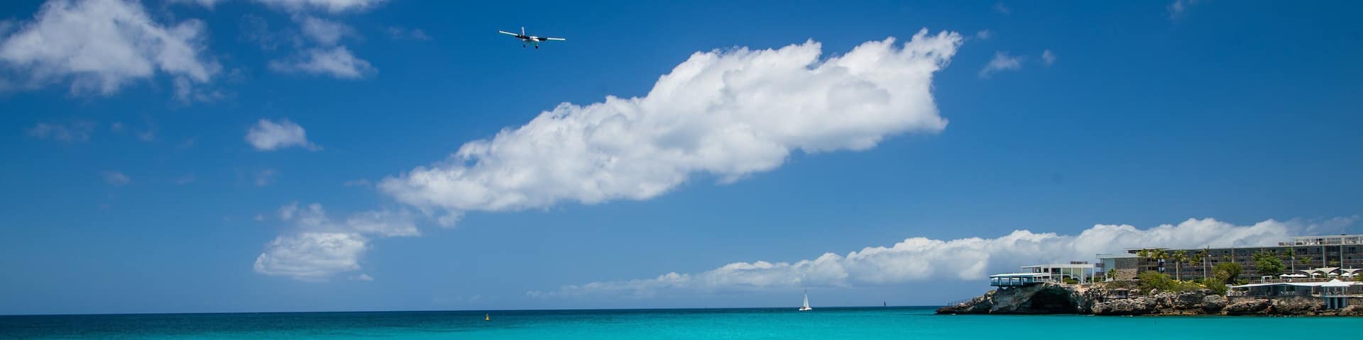 Maho Reef showing tropical scenes and general coastal views