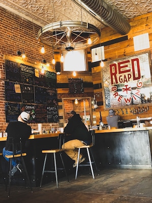 Beer, barbecue on the pit outside, cool atmosphere after a long hike, best way to spend an afternoon.