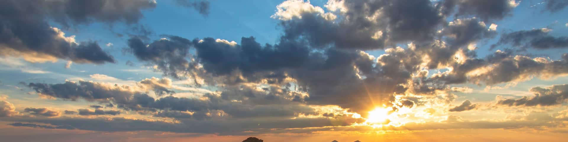 A mountain range with a sunset.