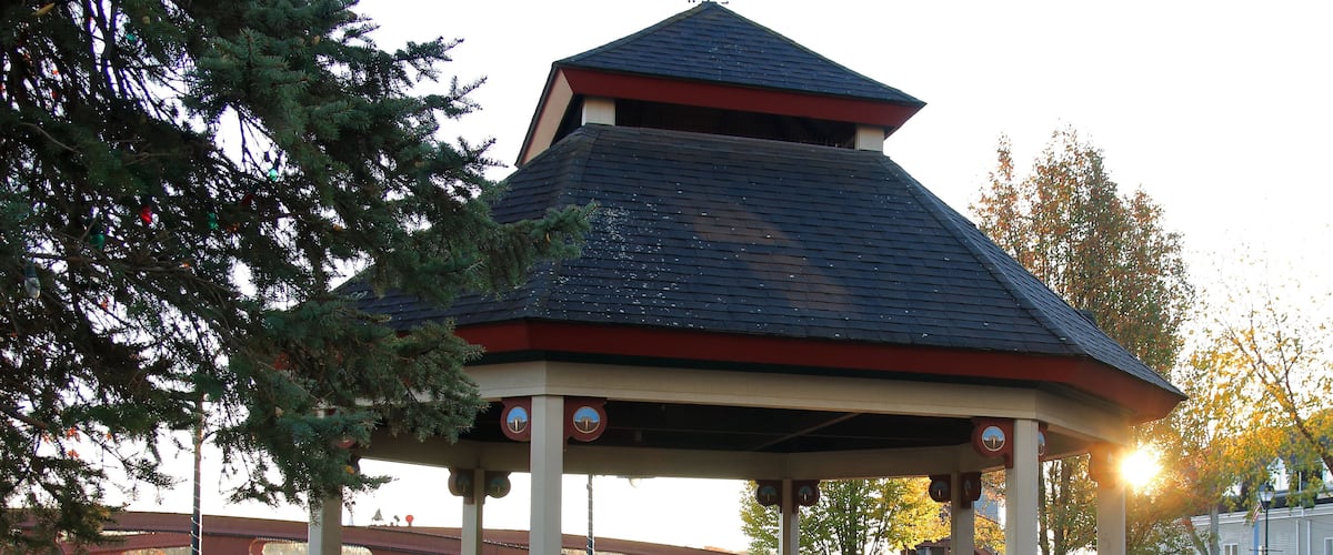 Gazebo At Sunrise With Fall Colors In A Scenic Village