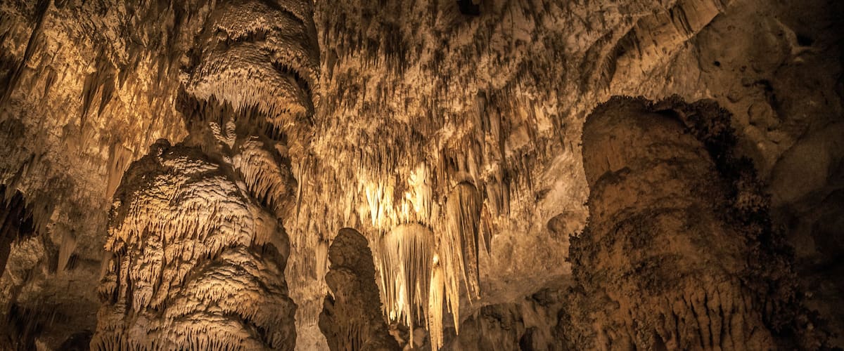 A cave with stalactites and stalagmites.