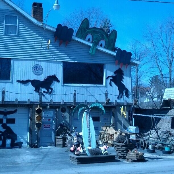 Some sort of demon watches over this house and all its eclectic decorations...