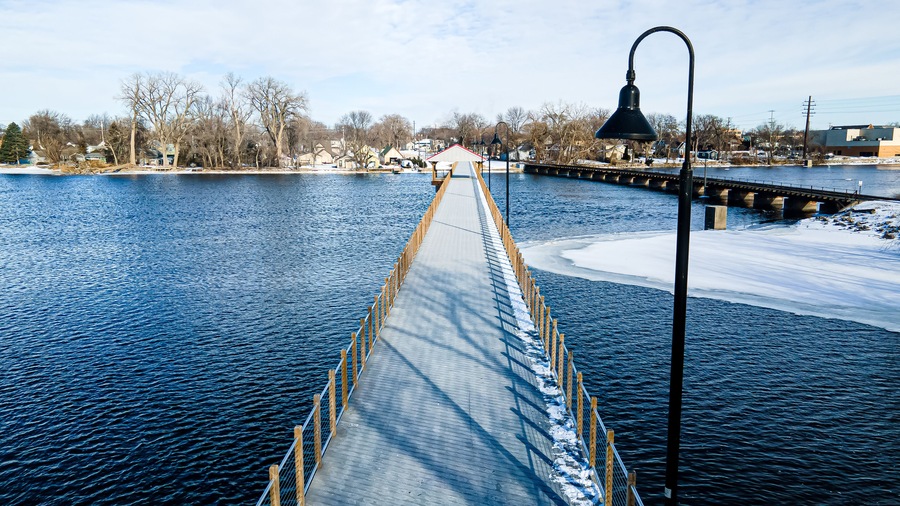 Public footbridge over icy waters