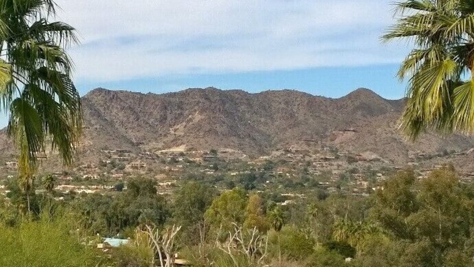 View over nearby mountains from the main building at Sanctuary Resort and Spa. This is your view at Breakfast...