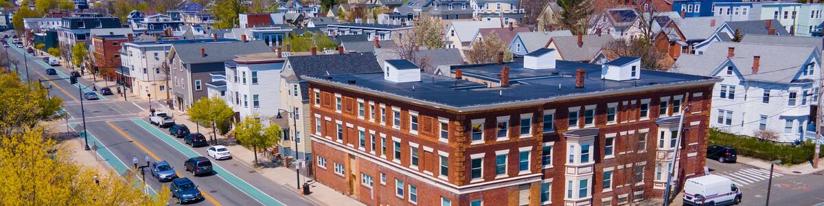 Somerville city center aerial view on Somerville Avenue at Central Street in spring, city of Somerville, Massachusetts MA, USA.