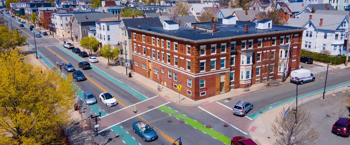 Somerville city center aerial view on Somerville Avenue at Central Street in spring, city of Somerville, Massachusetts MA, USA.