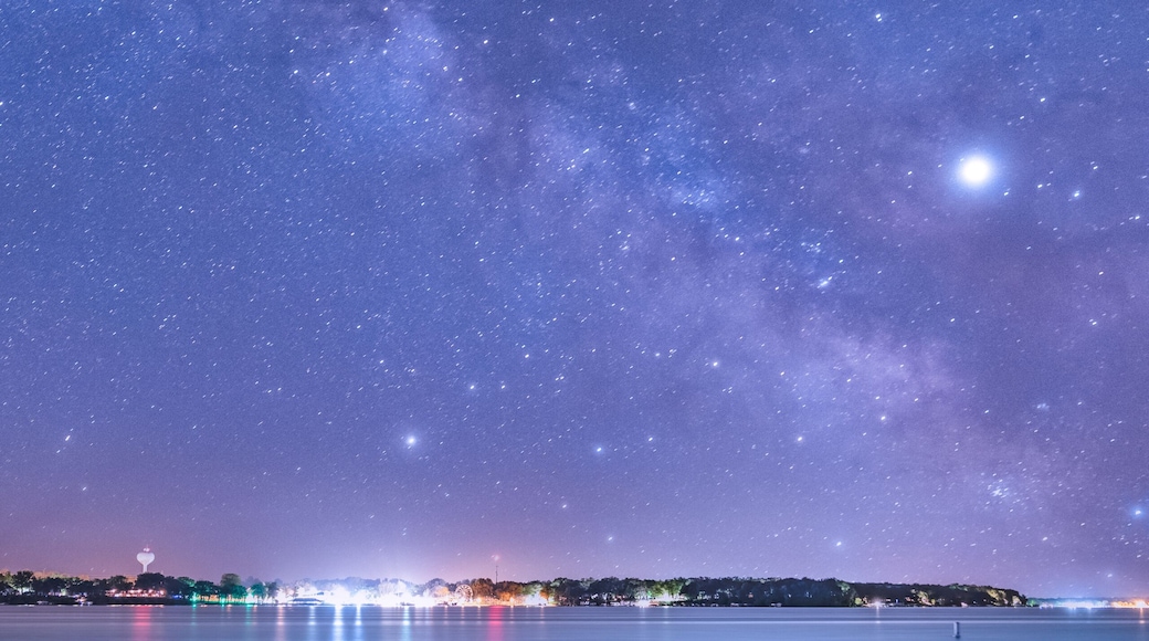 Stargazing At Lake On A Dock