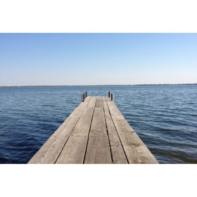 Iowa's largest natural lake. Part of the Iowa Great Lakes resort region. #lake #dock #iowa #travel #explore #water