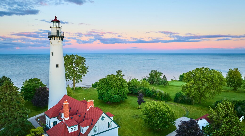Aerial View of Wind Point Lighthouse at Sunset Over Lake Michigan