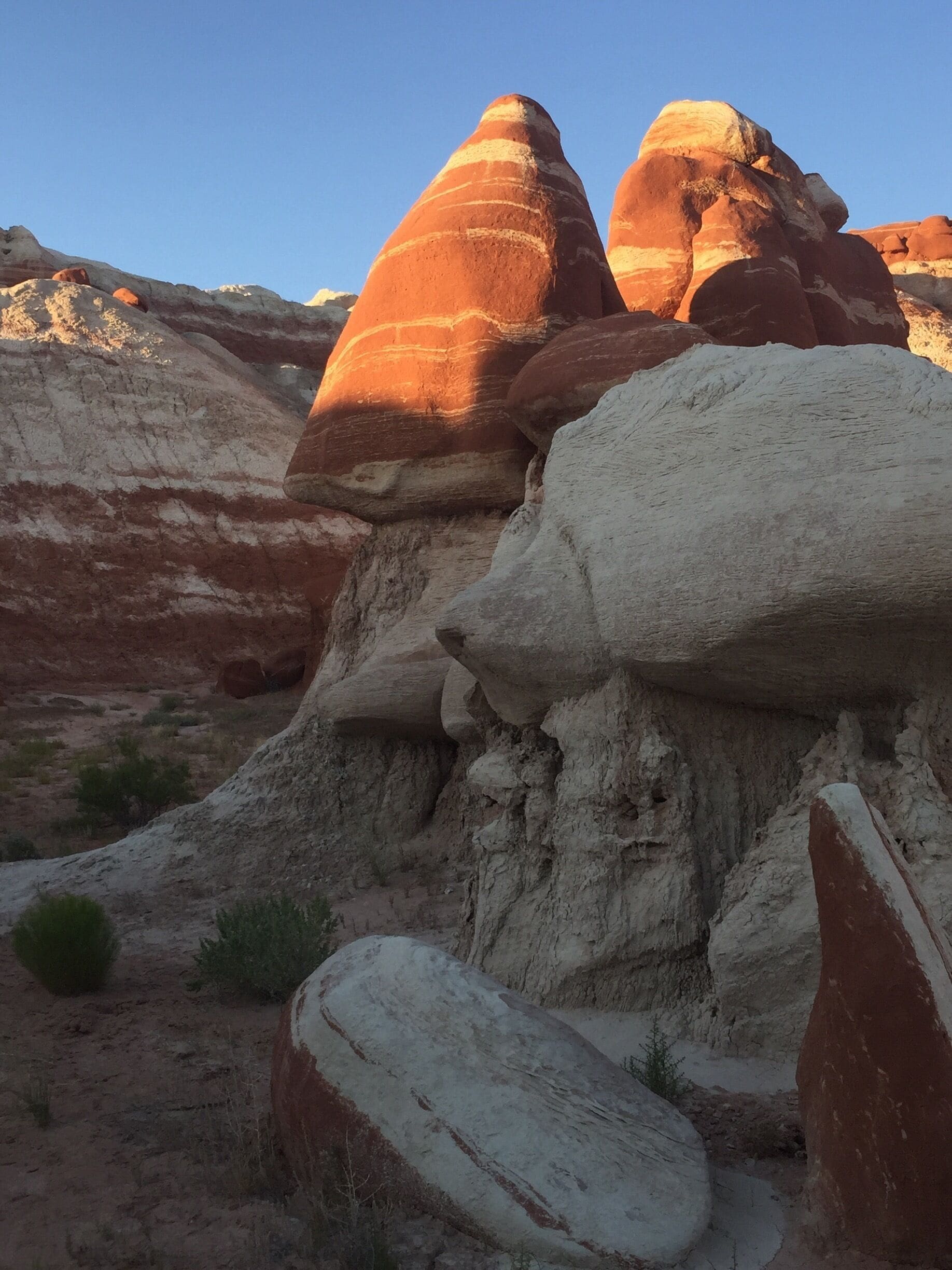 A desert landscape with prominent rock formations.