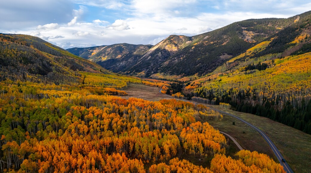 Scenic landscape of Crystal Creek river valley in Colorado during autumn time.