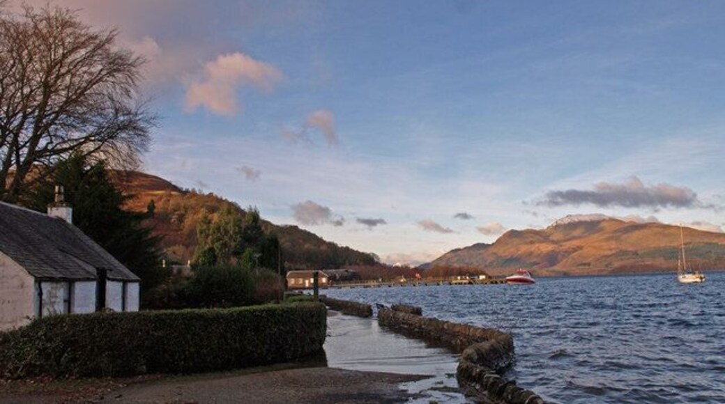 Luss, Loch Lomond High water today. A local told me that this cottage was due to be demolished as it had continually been flooded and was unsafe. First snow I have seen this Winter on the mountain tops.