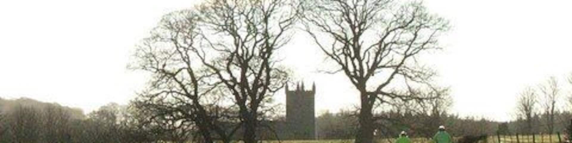 Cyclists Road from Glanton to Whittingham with the church in the distance.
