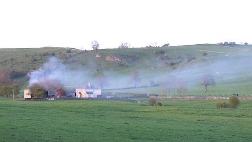 Near Parwich. The photo shows bonfire smoke drifting across Dulands Farm.