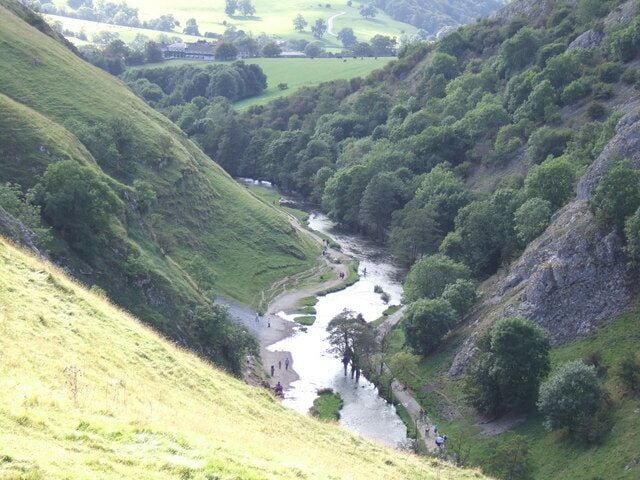 (River) Dove from above Lower arm of Dove Dale, below the stepping stones, taken from part-way up Thorpe Cloud. Keywords: dove dale, river, hill, peaks, peak district, derbyshire