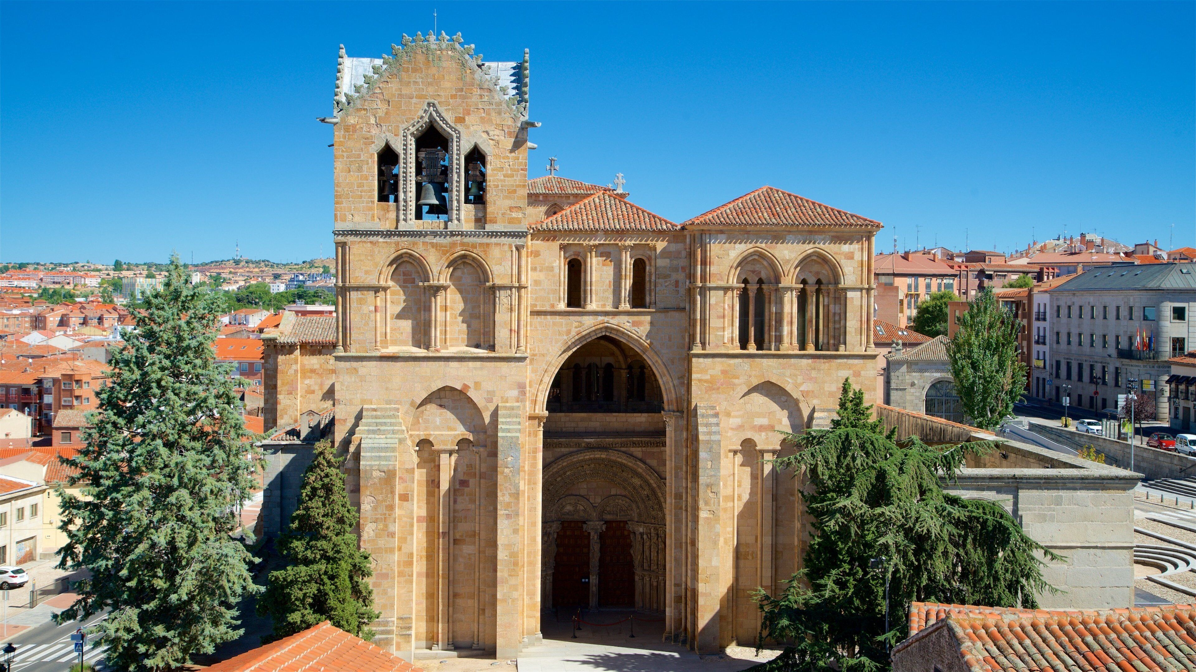 A historic church with a bell tower and arched windows.