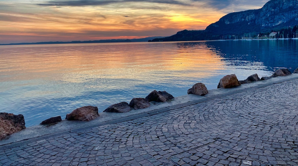 Sunset over Lake Garda, Italy – scenic waterfront landscape