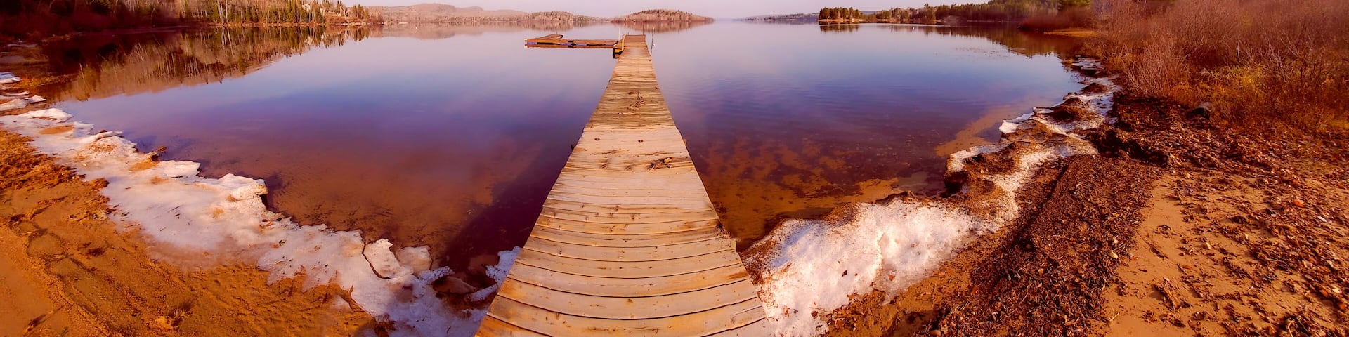 Dock on a wild lake in Quebec, Canada