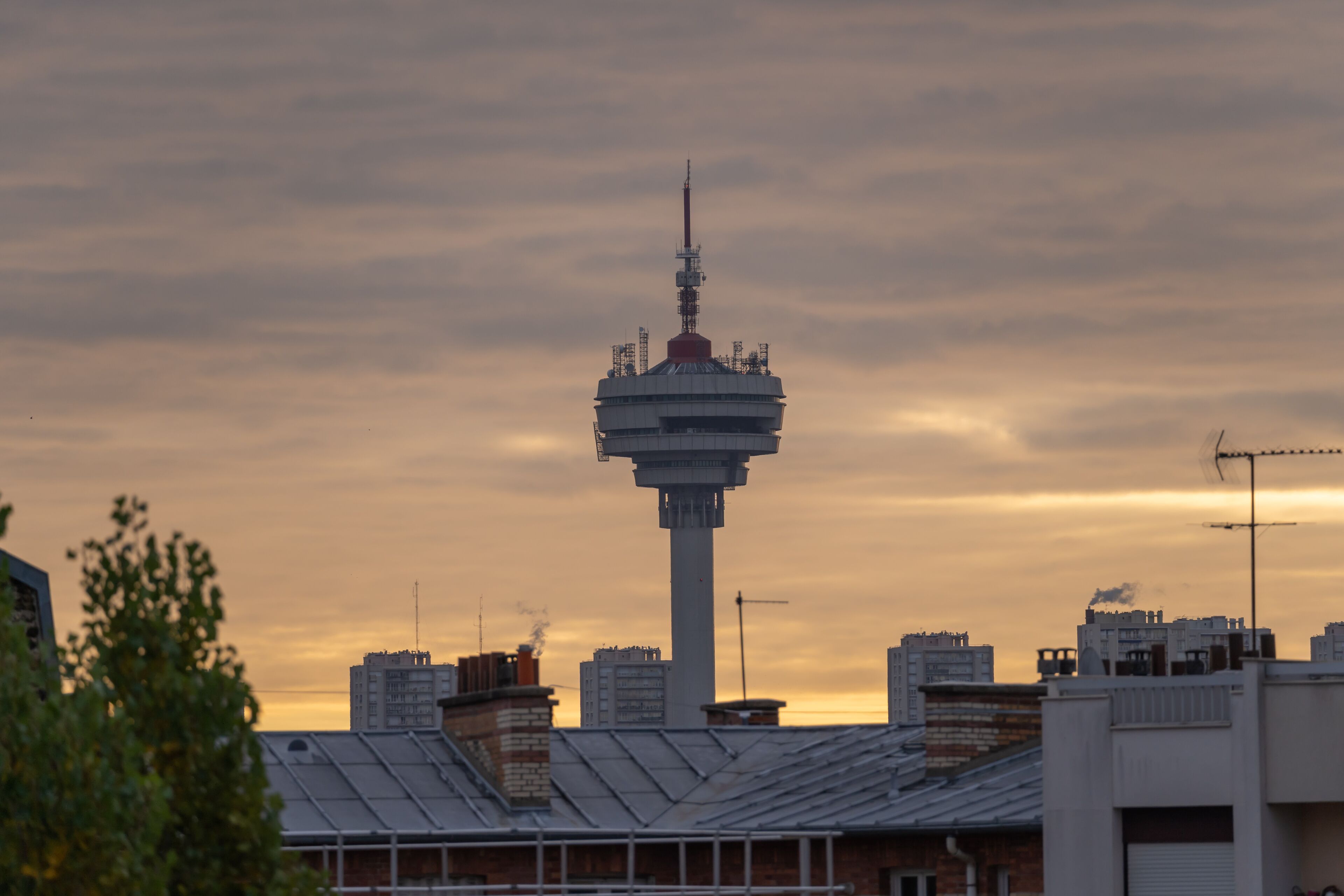 Les Lilas, France - 10 23 2021: View of TDF microwave tower Romainville site at sunrise