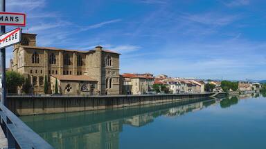 Panoramic view of the Isere river on the Old Bridge connecting Romans-sur-Isere to Bourg de Peage