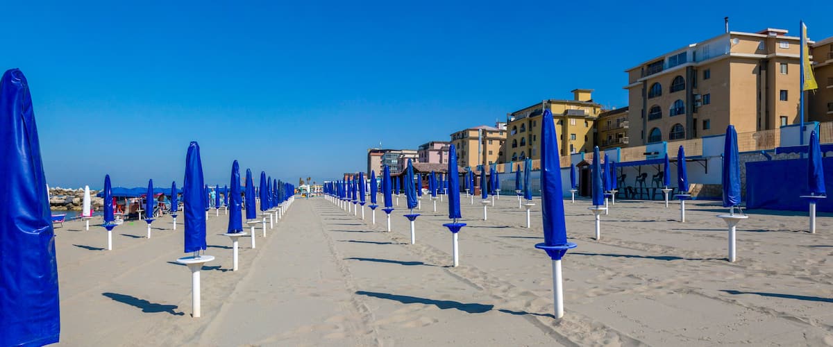 Castel Volturno, Italy - August 20 2019: View of the morning Beach by the sea in the city of Castel Volturno in Italy