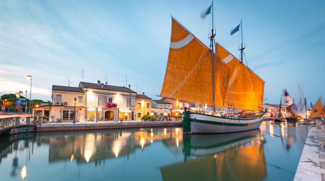 Cesenatico which includes a sunset and a bay or harbor