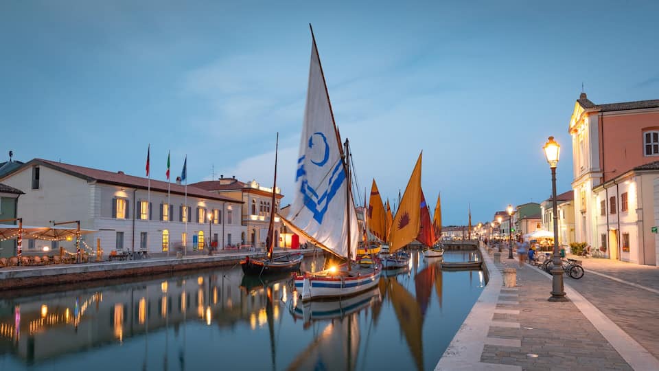 A canal with boats and buildings along the water.