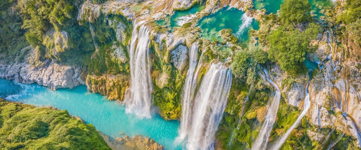 Amazing crystalline blue water of Tamul waterfall at Huasteca Potosina in San Luis Potosi, Mexico
