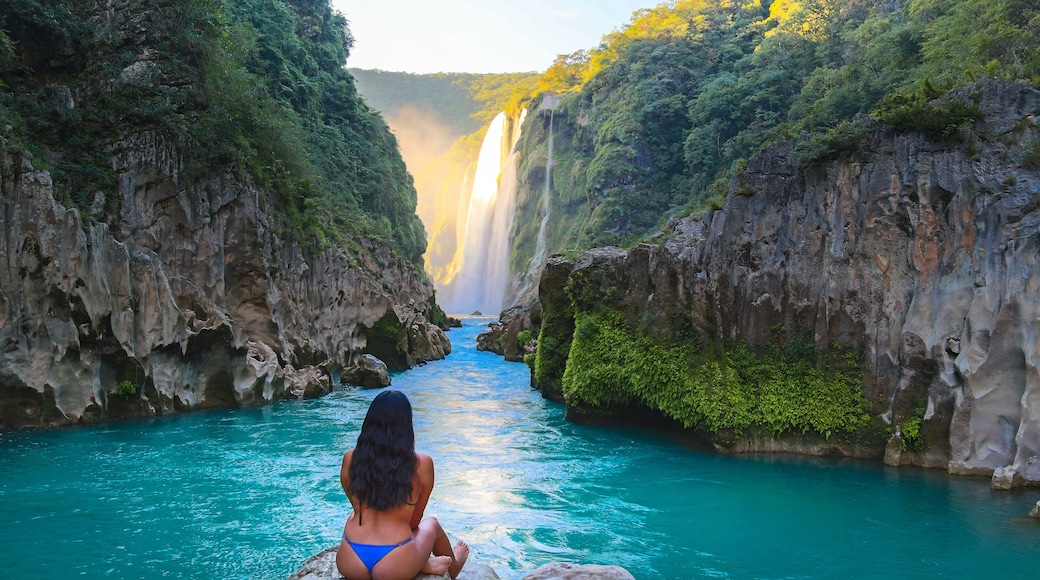 TAMUL, SAN LUIS POTOSI MEXICO - January 6, 2020:young women posing in River amazing crystalline blue water of Tamul waterfall