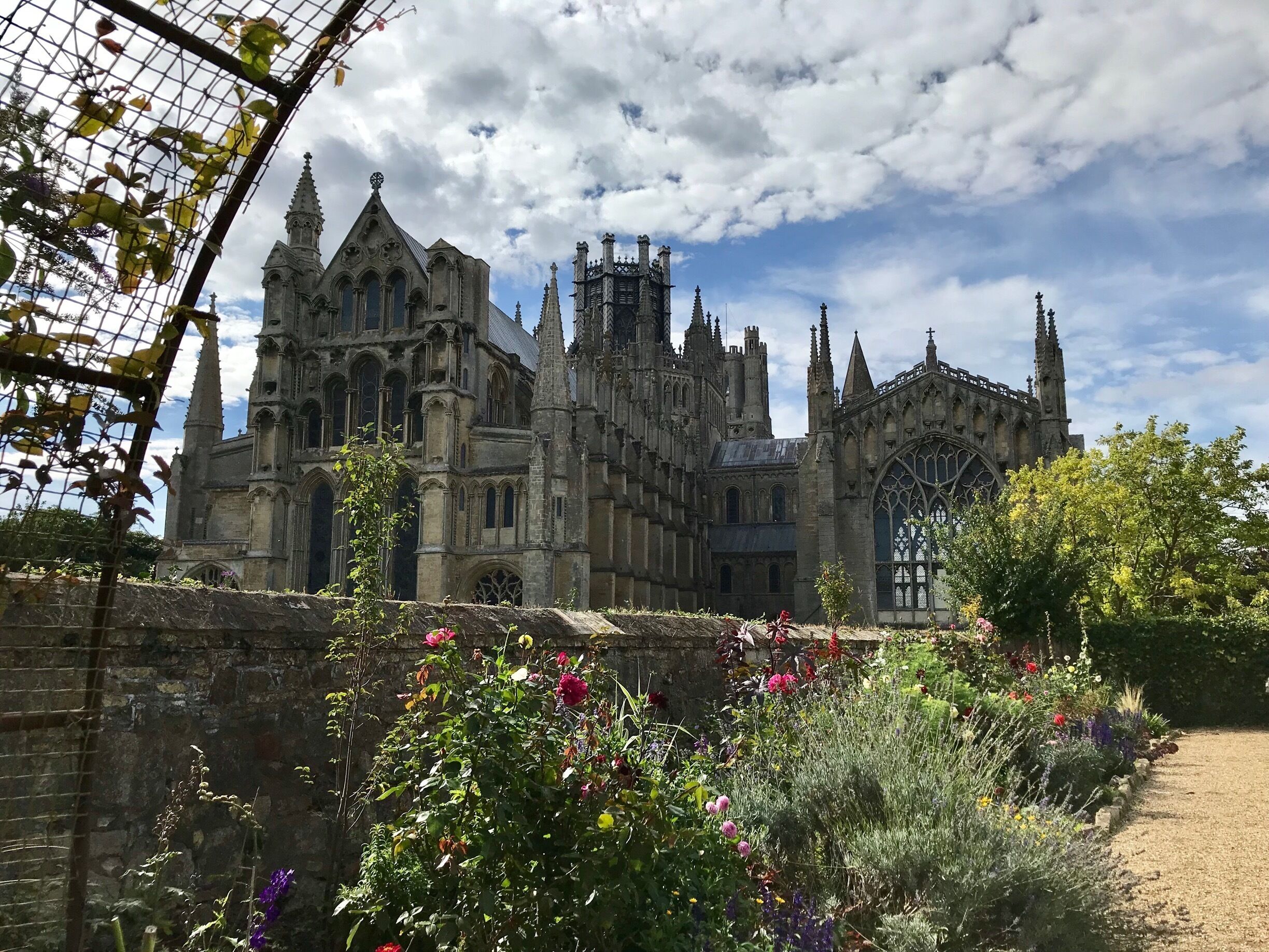 England’s Third Longest Cathedral 

Ely Cathedral, with its unique 14th century octagonal lantern tower, is counted among the marvels of the medieval world. Much of the cathedral is over 900 years old and it offers a rich architectural history, including the sumptuous 13th century Quire and beautiful 14th century Lady Chapel.
Around the cathedral itself you can explore attractive parkland and one of the largest collections of medieval monastery buildings still in daily use. It is easy to spend a whole day, and longer, visiting the cathedral, and also the city of Ely with its attractive riverside and other tourist attractions.