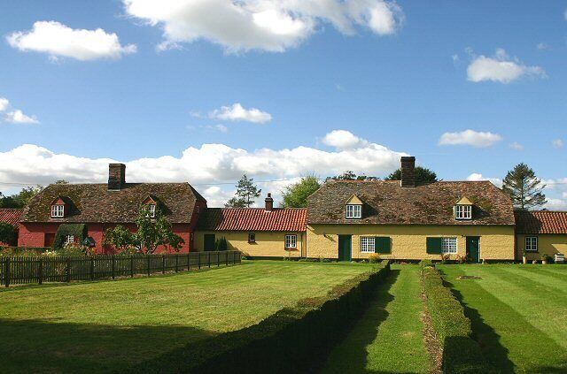 Estate cottages, Chippenham These former estate cottages, known as William and Mary houses, have been converted from tiny dwellings into substantial houses. Each of the two houses in this photo were originally three or four cottages. The long gardens remain, fronting onto the High Street.