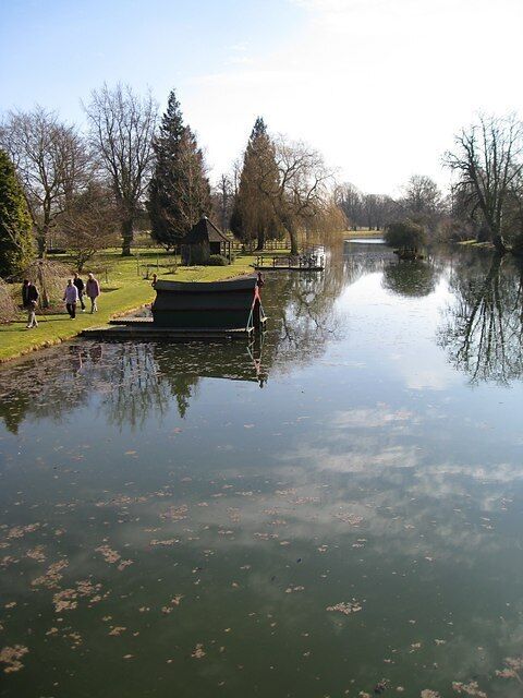 View from the bridge The still waters of the man made lake reflect the sky.