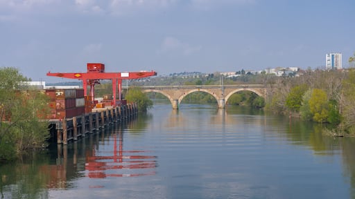 Gennevilliers, France - 04 21 2021: Banks of the Seine. Containers and lifting gear in the Port of Gennevilliers