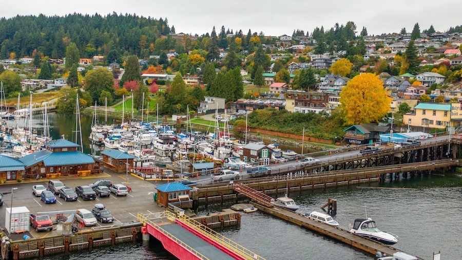 Gibsons which includes a small town or village, a bay or harbor and landscape views