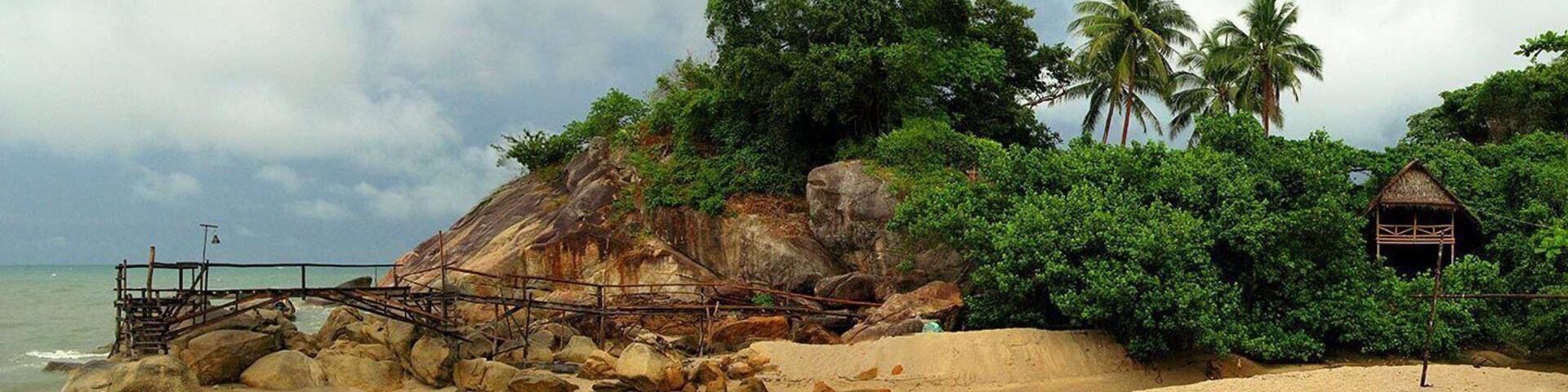 Not easy to reach by land, although a knobby-tired scooter can negotiate the often washed-out road.
If the road is in good condition, a truck taxi can make it. There's a shuttle from Thong Sala.
Otherwise, your best bet is to catch a long tail taxi boat.
The bungalow in the photo is one of dozens of extremely interesting and unique places to stay here.