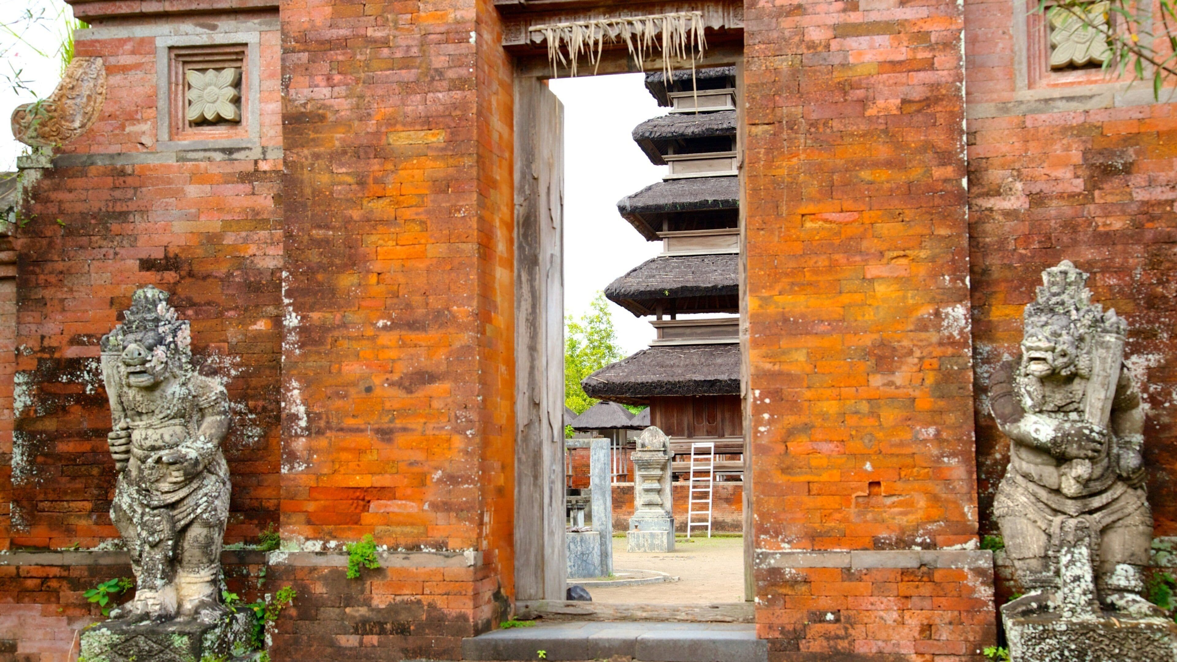 Mataram which includes a temple or place of worship and heritage architecture