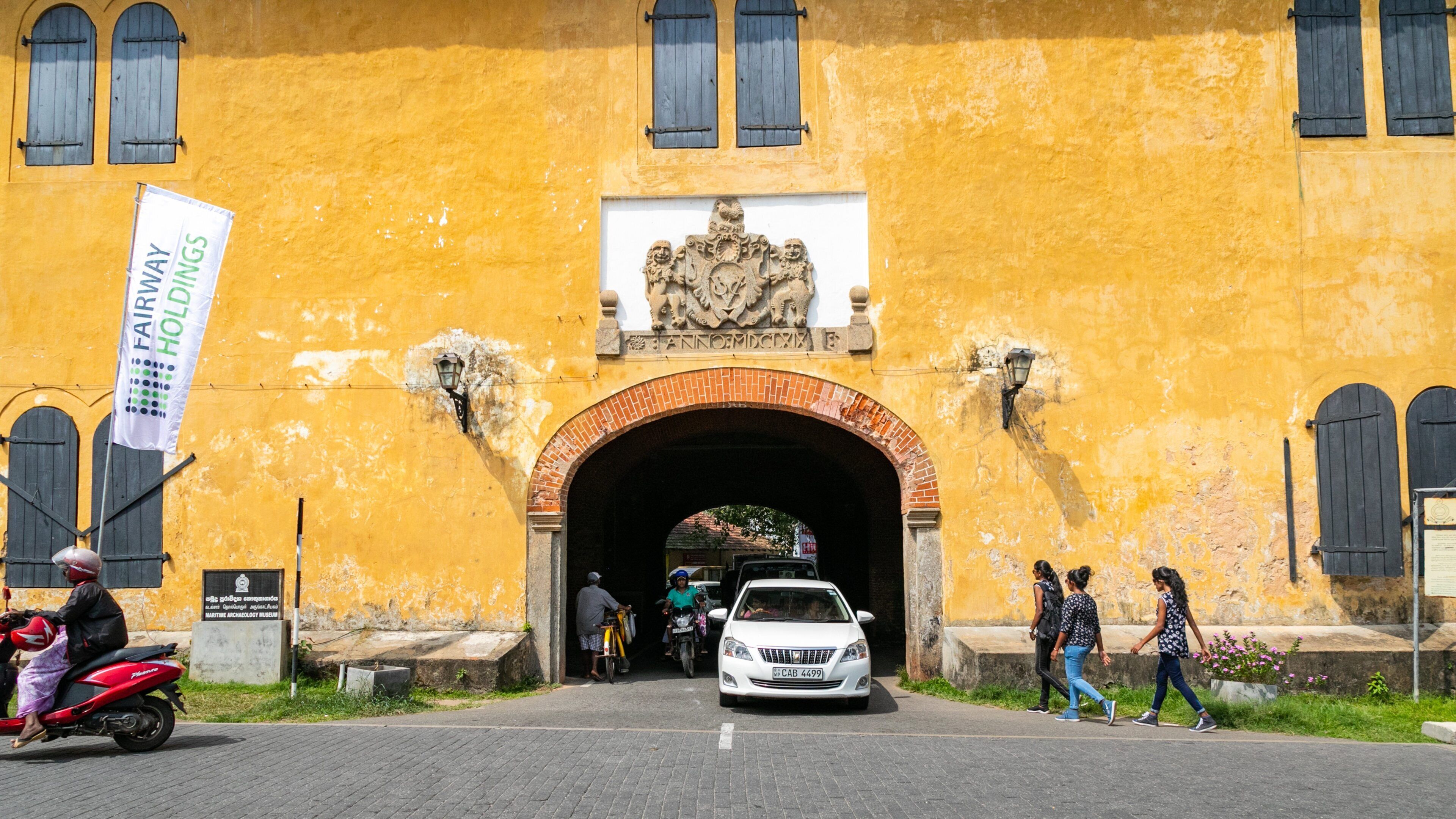 Dutch Fort showing street scenes as well as a small group of people