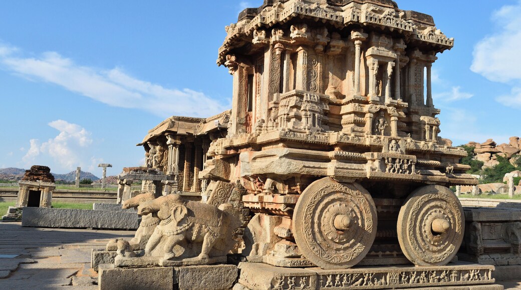 This iconic chariot housed within the Vithala (another name for Lord Vishnu) complex was built in the 15th century by King Devaraya. This complex is a must visit on every Hampi itinerary. Appreciate the craftsmanship of the towering gateways, intricately carved pavilions and structures and the unique musical pillars.