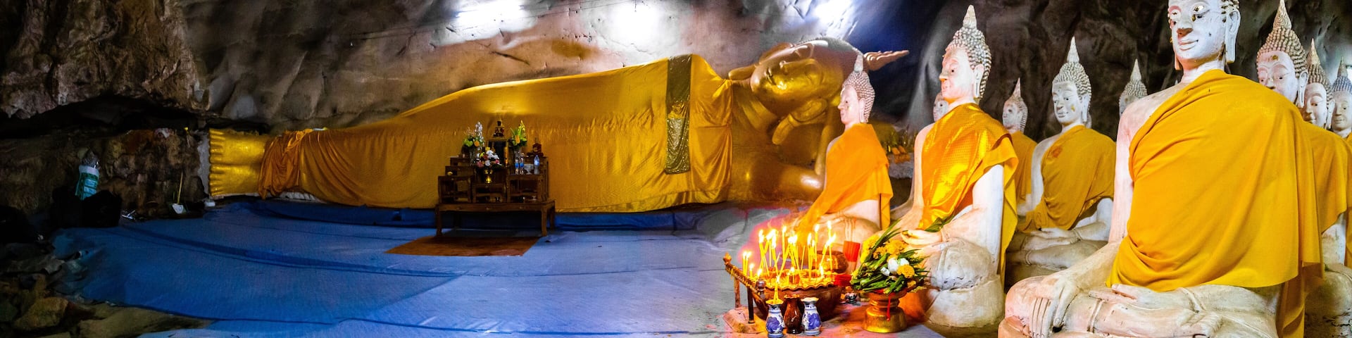 Wat Ao Noi buddha statues in the cave in Prachuap Khiri Khan, Thailand