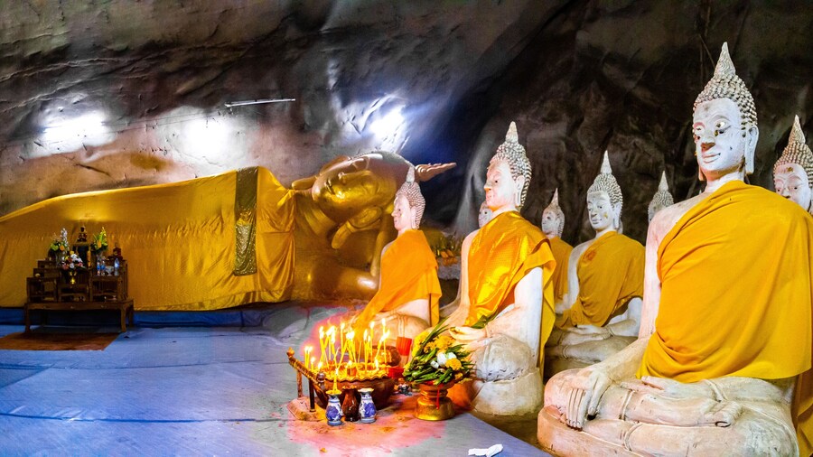Wat Ao Noi buddha statues in the cave in Prachuap Khiri Khan, Thailand