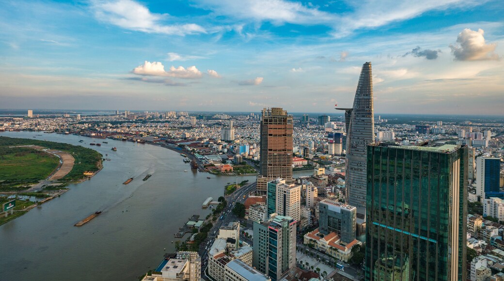 HO CHI MINH, VIETNAM - NOV 20, 2017: Royalty high quality stock image aerial view of Ho Chi Minh city, Vietnam. Beauty skyscrapers along river light smooth down urban development in Ho Chi Minh City