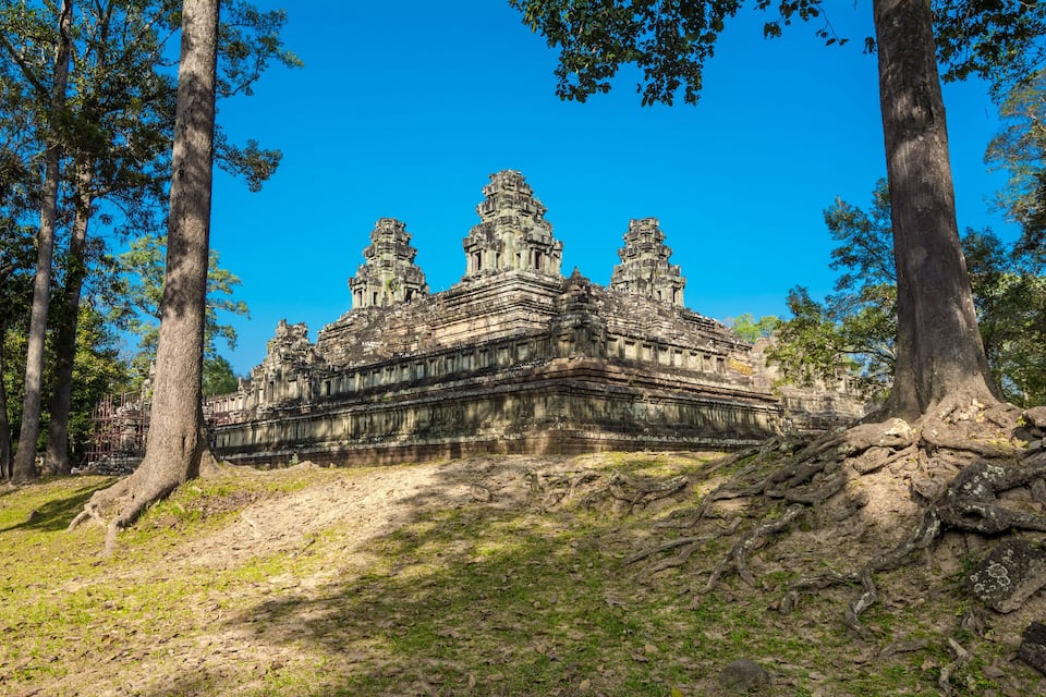 A temple complex surrounded by trees.
